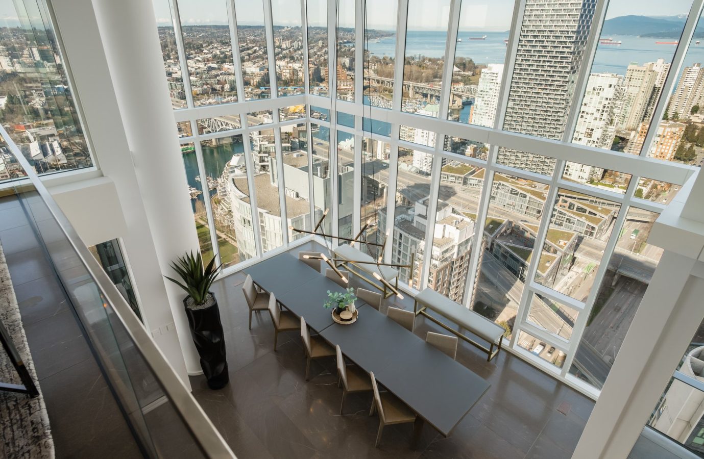Top view of Penthouse dinner room with a background of the city