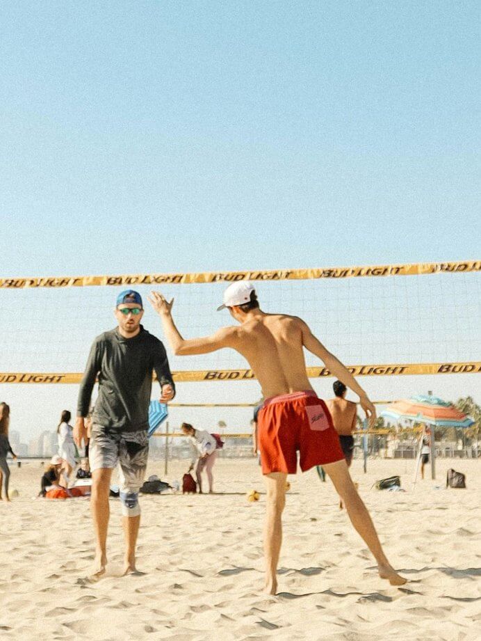 People playing beach volleyball at Belmont Shore in Long Beach